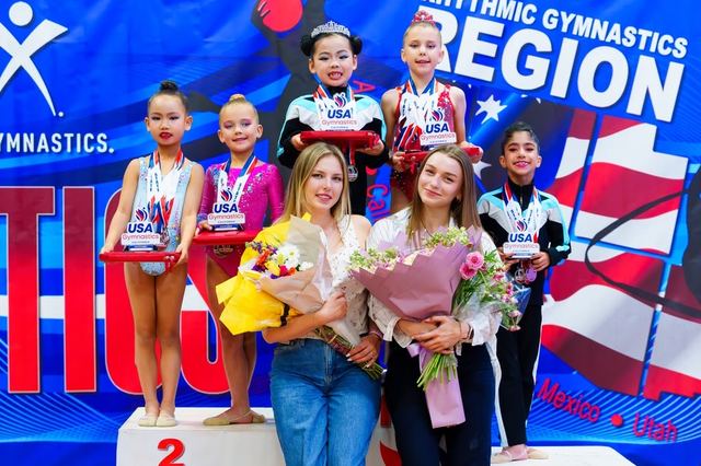Gymnasts on the podium at a regional championship